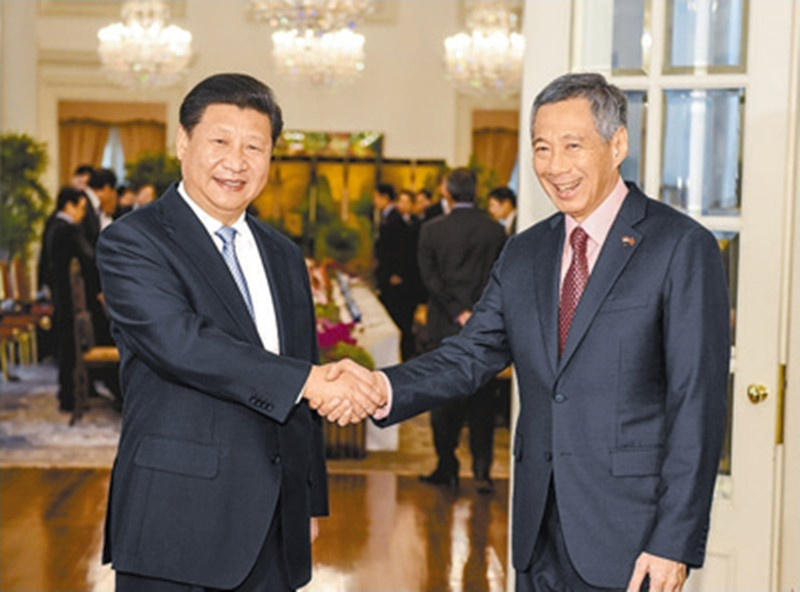 ཞི་ཅིན་ཕིང་གིས་སང་གྷ་ཕོར་ནས་སང་གྷ་ཕོར་གྱི་ཙུང་ལི་ལི་ཞན་ལོན་དང་གྲོས་མོལ་མཛད།