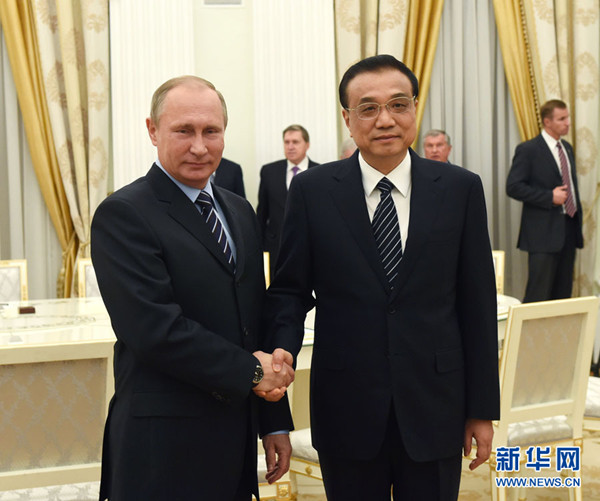 ལི་ཁེ་ཆང་གིས་ཨུ་རུ་སུའི་སྲིད་འཛིན་ཕུའུ་ཅིན་དང་མཇལ་འཕྲད་གནང་། 