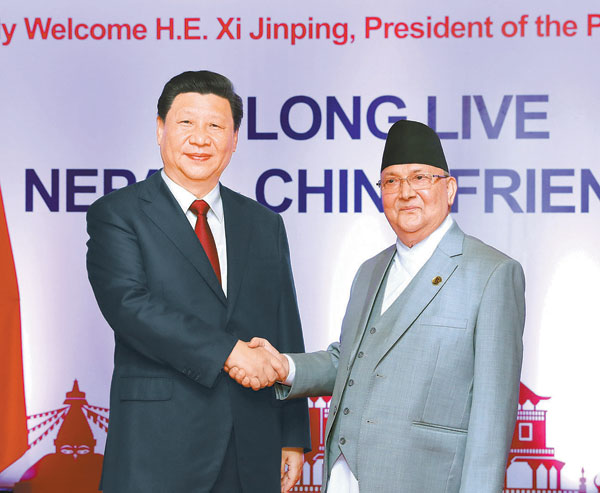ཞི་ཅིན་ཕིང་ཙུང་ཐུང་པན་ཏ་ལིས་བཤམས་པའི་དགའ་བསུའི་གསོལ་སྟོན་ལ་ཞུགས་པ་དང་འབྲེལ་ནེ་པ་ལའི་ཙུང་ལི་ཨའོ་ལི་དང་གྲོས་མོལ་གནང་བ།